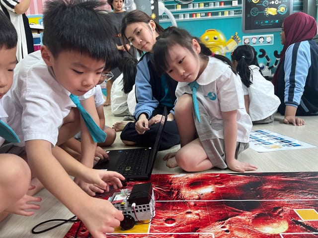 Child learning coding at ChildFirst
