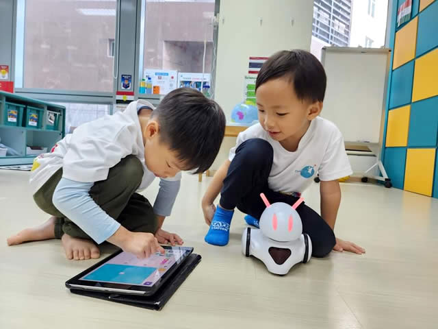 Children learning robotics